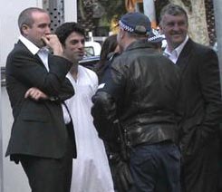 The Chaser guys after they were arrested at APEC. Chas doesn't have any pants on. 