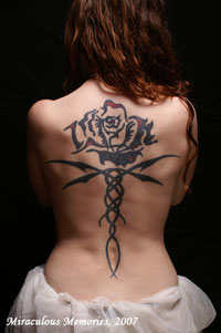 Tattoos inspired by the Kushiel fantasy books.